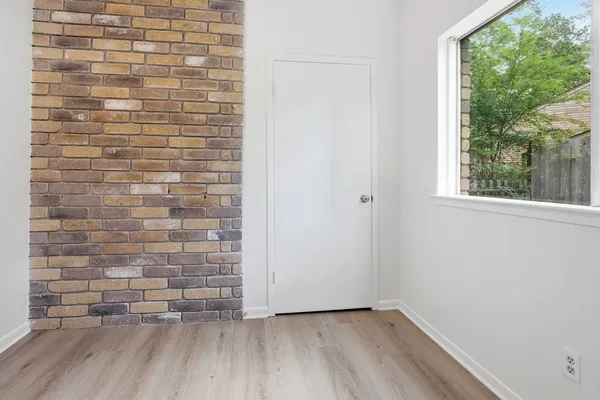 a view of an empty room and window