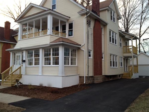 20-22 Standish Street Springfield, MA 01108 - Photo 1 of 27 a front view of a house with a yard