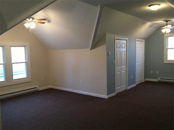 20-22 Standish Street Springfield, MA 01108 - Photo 20 of 27 an empty room with a empty space and windows