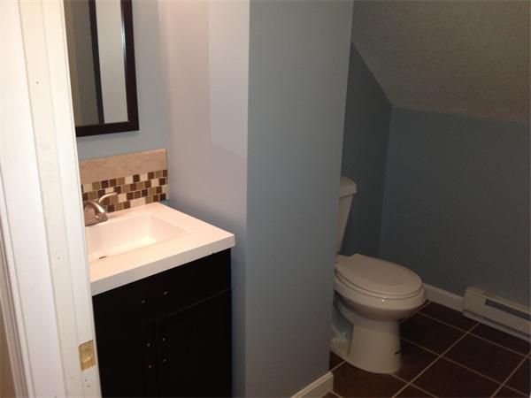 20-22 Standish Street Springfield, MA 01108 - Photo 24 of 27 a bathroom with a sink and a toilet