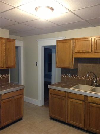 20-22 Standish Street Springfield, MA 01108 - Photo 5 of 27 a kitchen with sink and cabinets