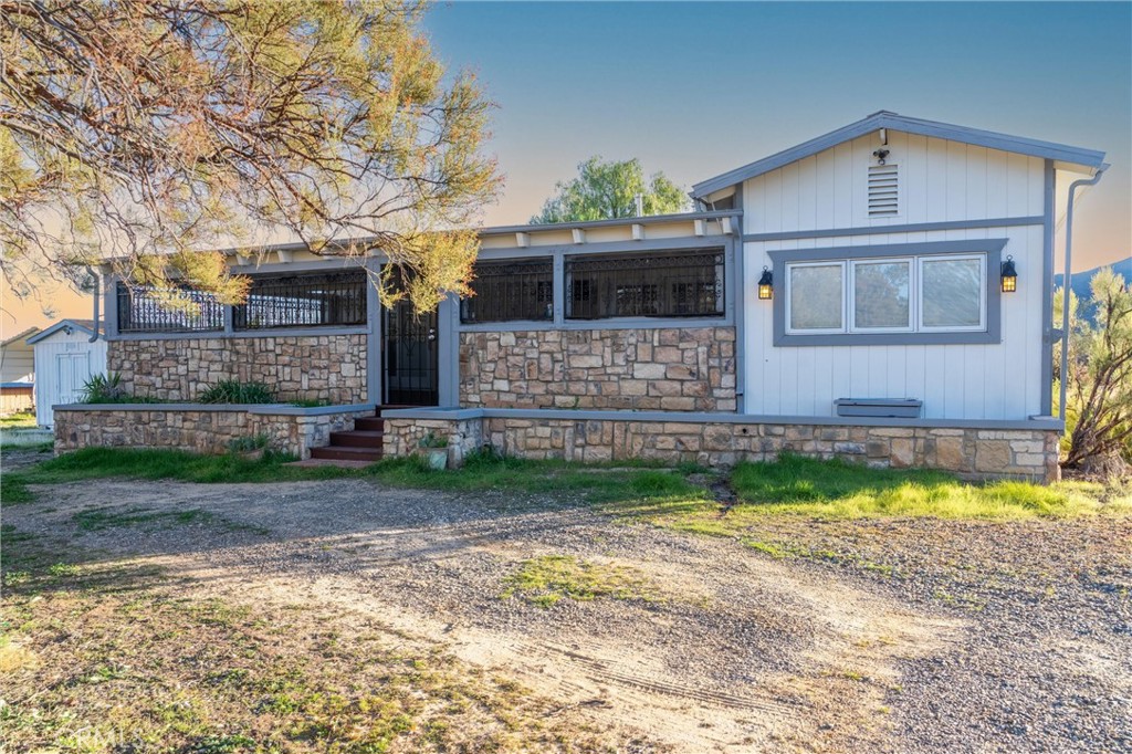 44270 Arya Court Anza, CA 92539 - Photo 2 of 64 a front view of a house with garden