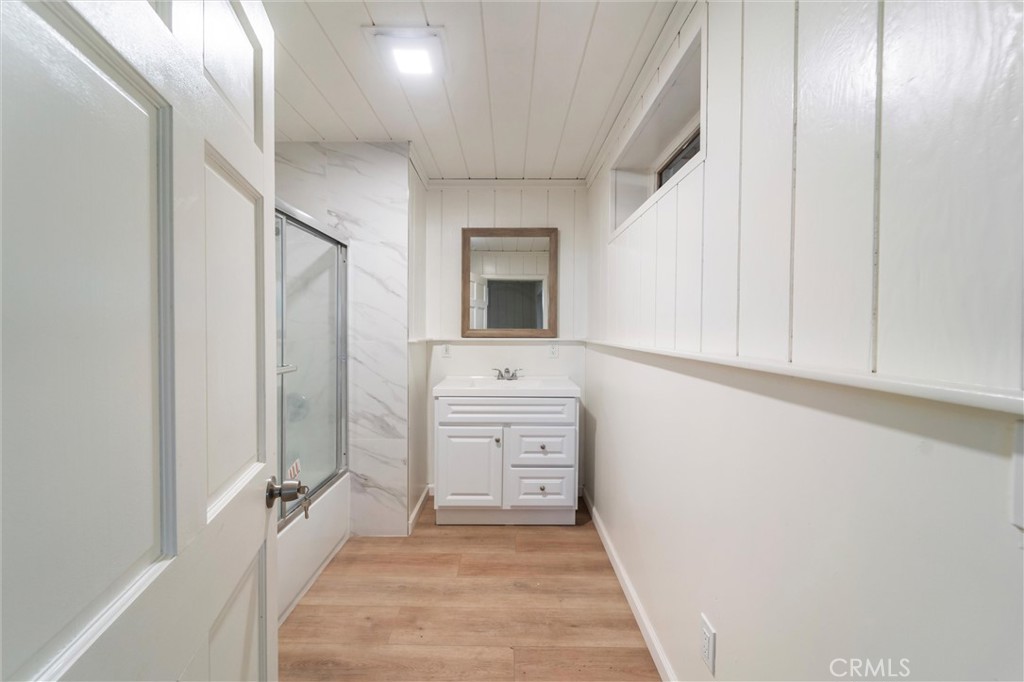 44270 Arya Court Anza, CA 92539 - Photo 26 of 64 a bathroom with a sink a mirror and a bathtub