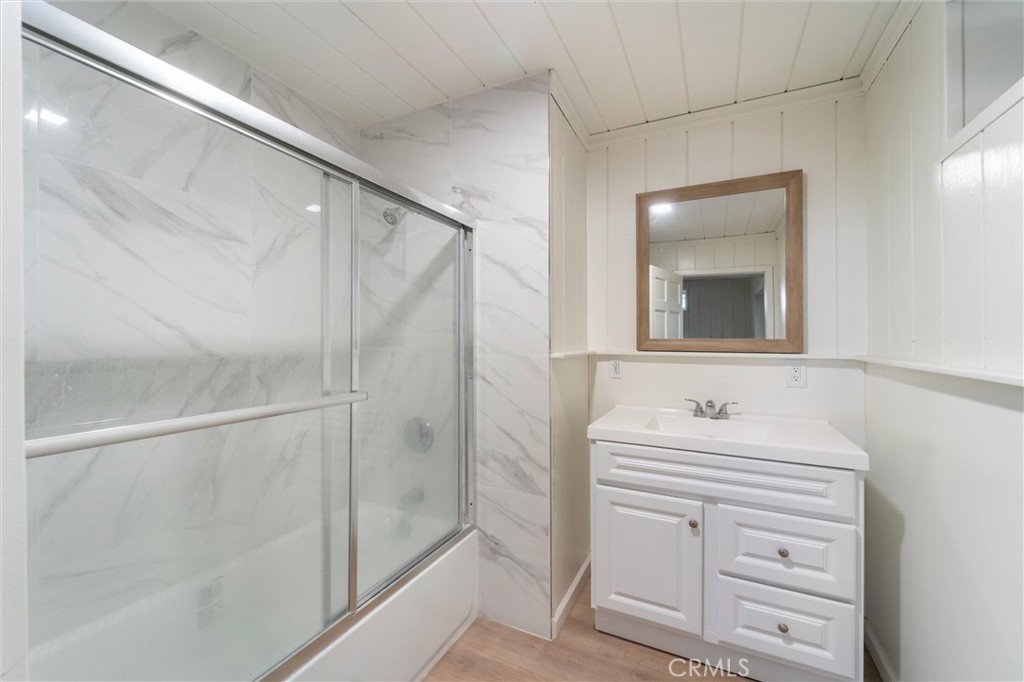 44270 Arya Court Anza, CA 92539 - Photo 27 of 64 a bathroom with a sink a mirror and a shower