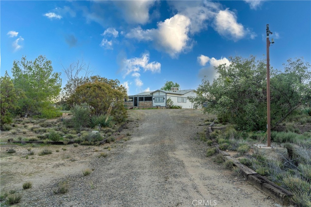 44270 Arya Court Anza, CA 92539 - Photo 34 of 64 a view of a road with a building in the background