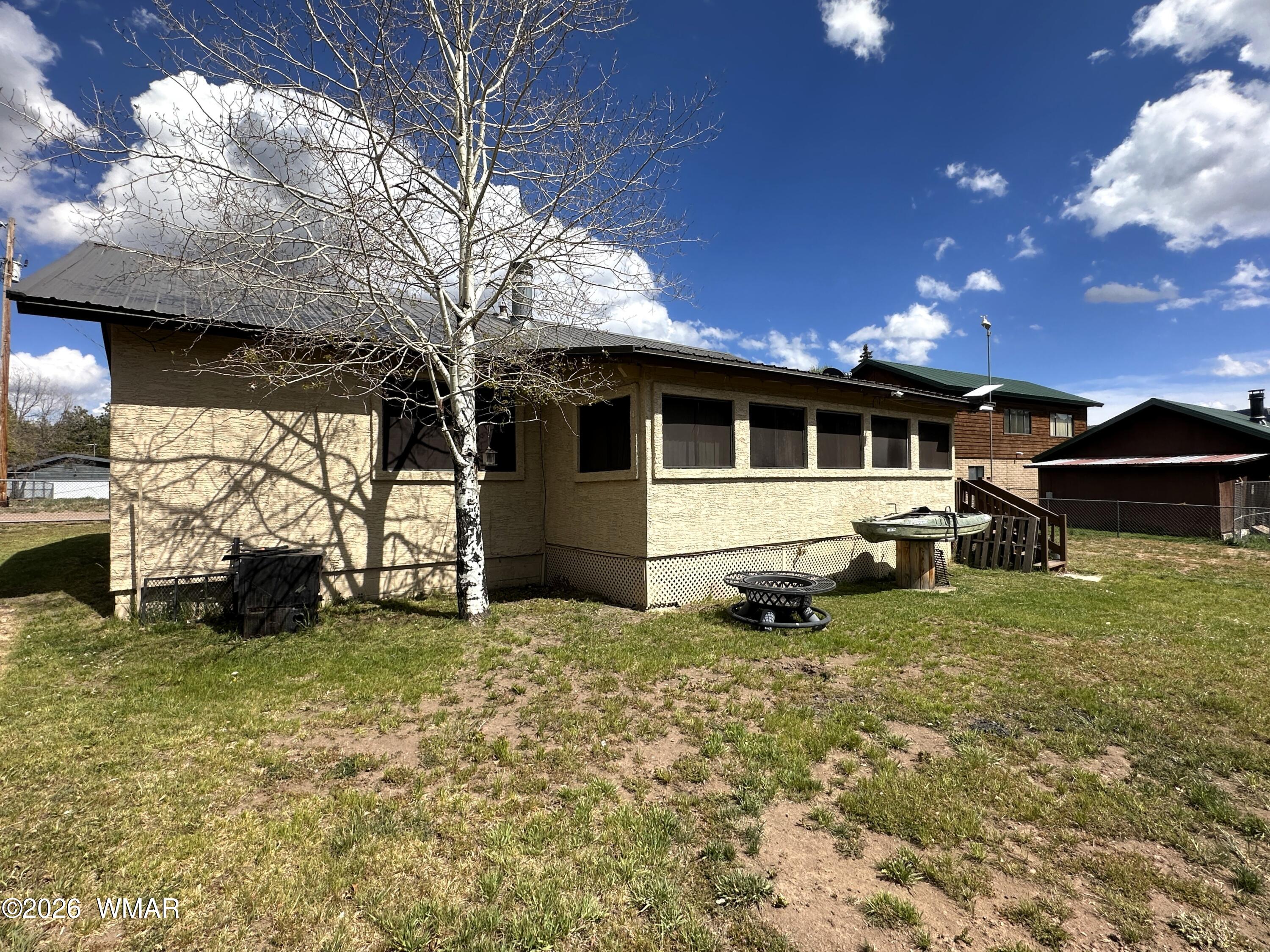 19 County Road Alpine, AZ 85920 - Photo 22 of 27 a house view with a garden space