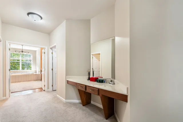 a view of bathroom with dual sinks