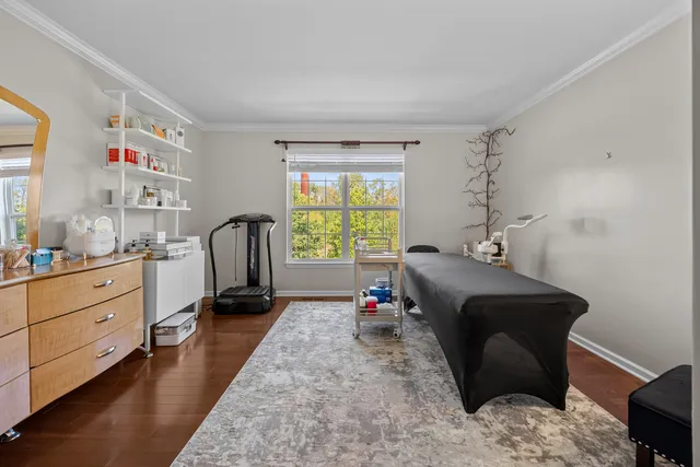 a bed room with a bed and a window