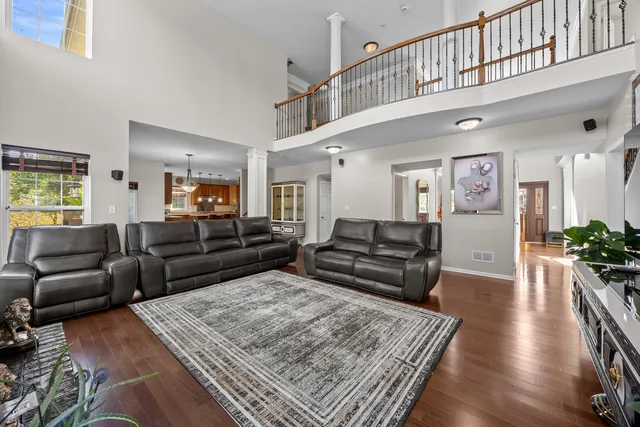 a living room with furniture and a rug