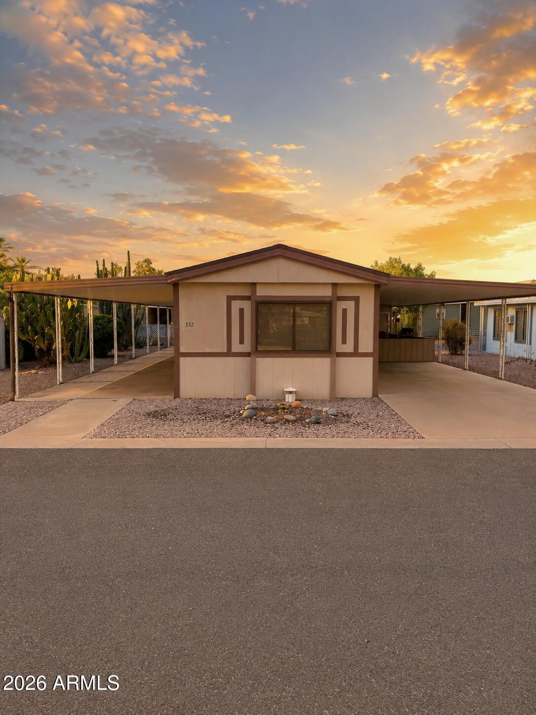 3330 East Main Street, Unit 332 Mesa, AZ 85213 - Photo 11 of 12 a view of a house with a garden