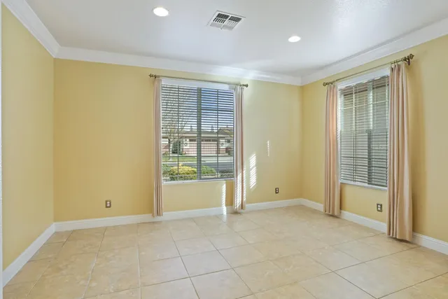 a view of a kitchen with a refrigerator in a kitchen