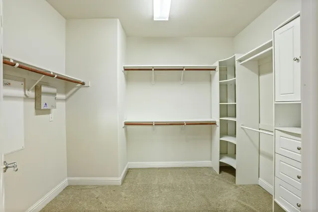 a bathroom with a double vanity sink toilet mirror and shower
