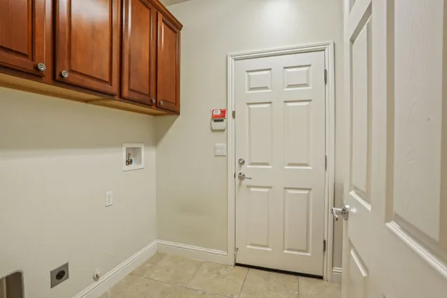 an aerial view of a house with a lake view