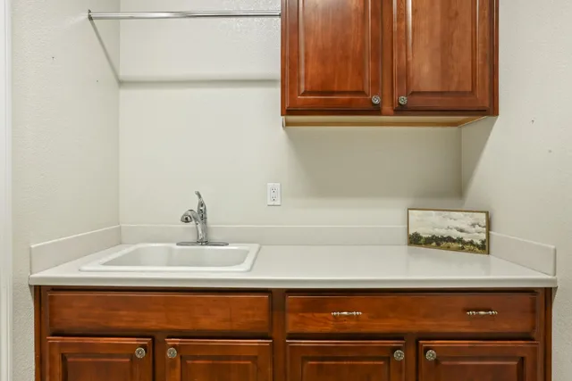 a view of a backyard with sitting area