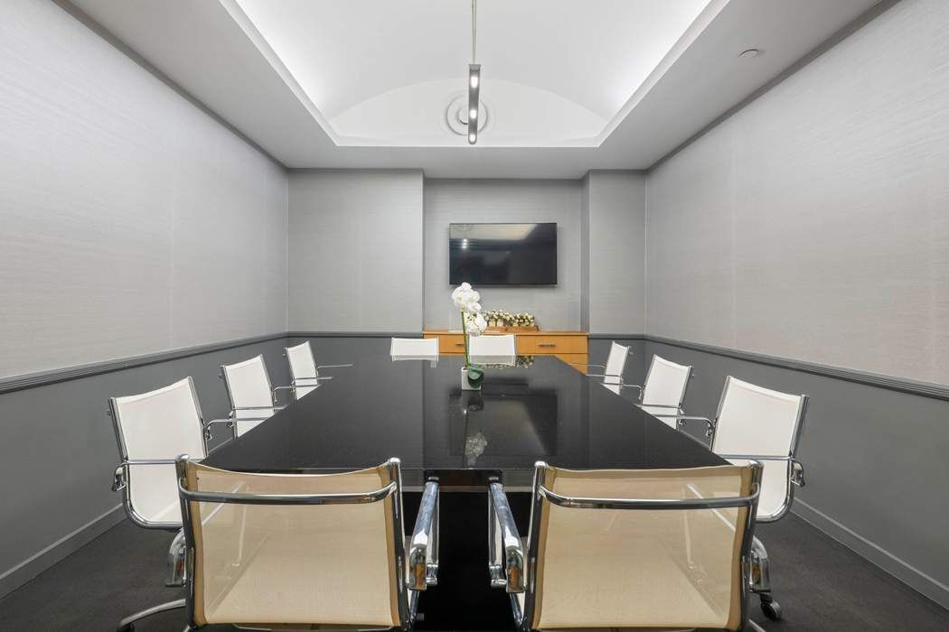 325 5th Avenue, Unit 18F Manhattan, NY 10016 - Photo 11 of 13 a table and chairs in a room