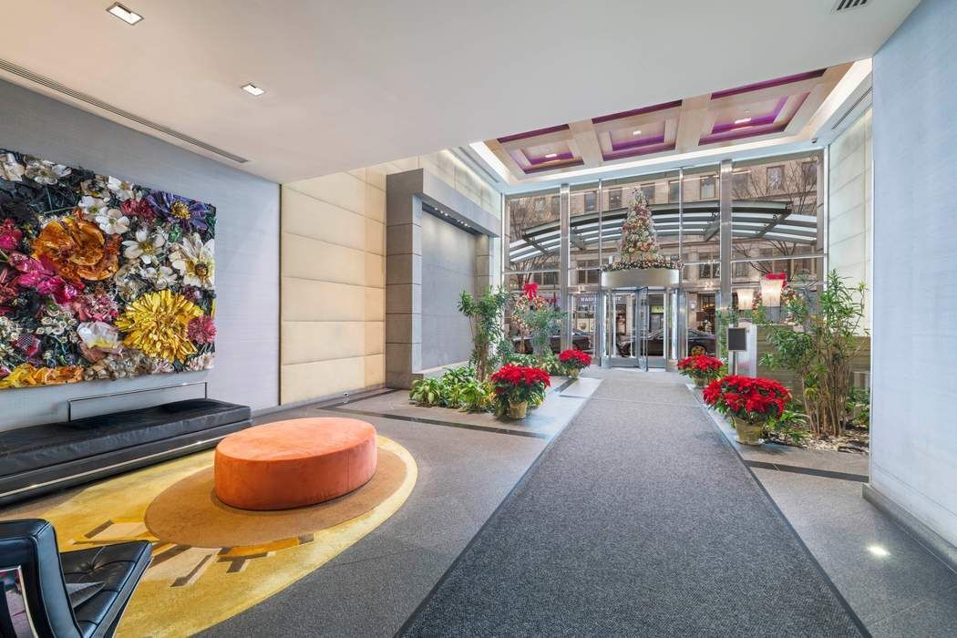 325 5th Avenue, Unit 18F Manhattan, NY 10016 - Photo 12 of 13 a room with flowers and toys