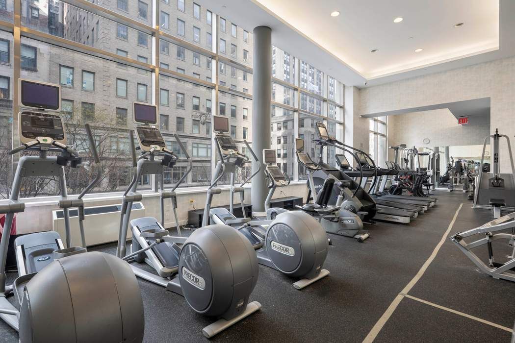325 5th Avenue, Unit 18F Manhattan, NY 10016 - Photo 8 of 13 a view of a room with gym equipment