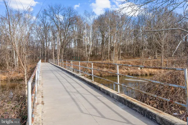 a view of a balcony with trees