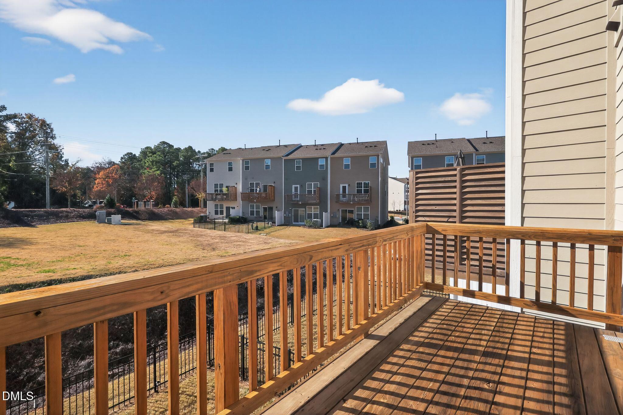 1118 Commack Drive Durham, NC 27703 - Photo 28 of 30 a view of balcony with wooden floor