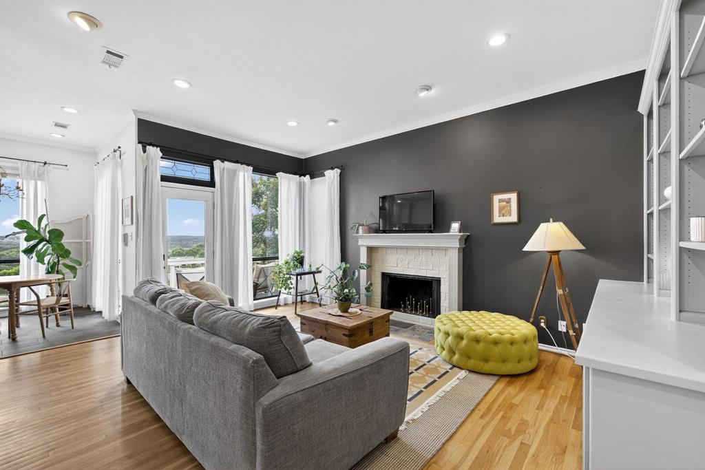 616 Crowley Road Arlington, TX 76012 - Photo 1 of 1 a living room with furniture fireplace and a flat screen tv
