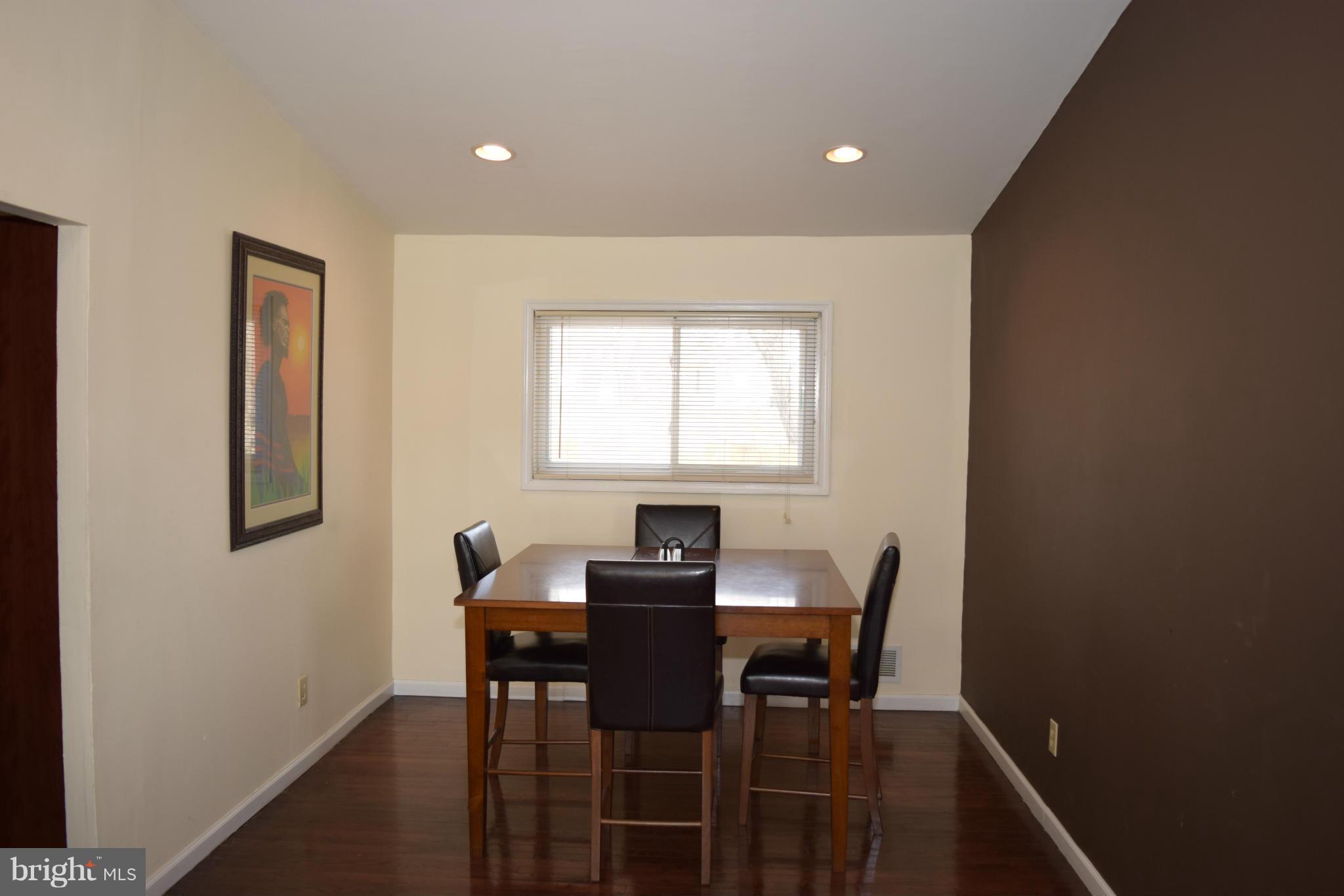 4775 Byron Road Baltimore, MD 21244 - Photo 11 of 29 a view of a dining room with furniture and window