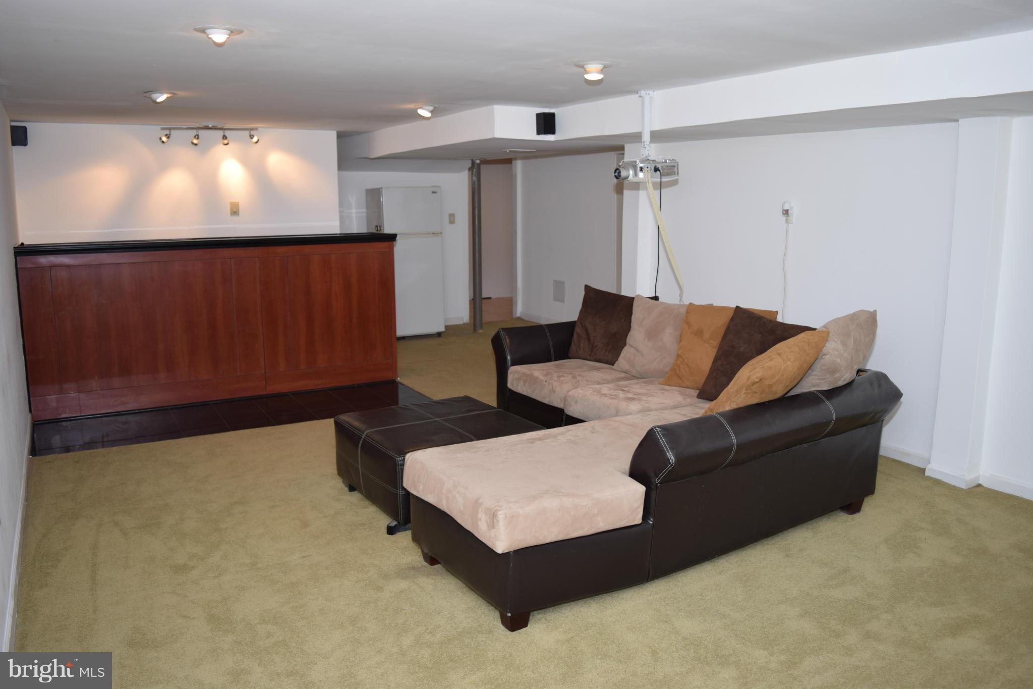 4775 Byron Road Baltimore, MD 21244 - Photo 12 of 29 a living room with furniture and a ceiling fan
