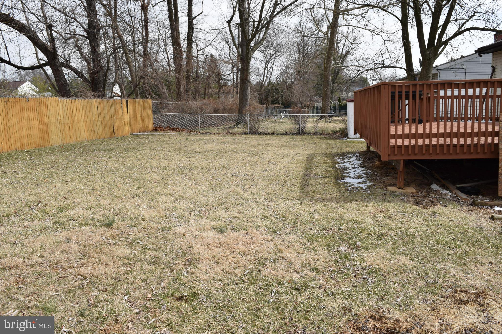 4775 Byron Road Baltimore, MD 21244 - Photo 27 of 29 a view of backyard and wooden fence