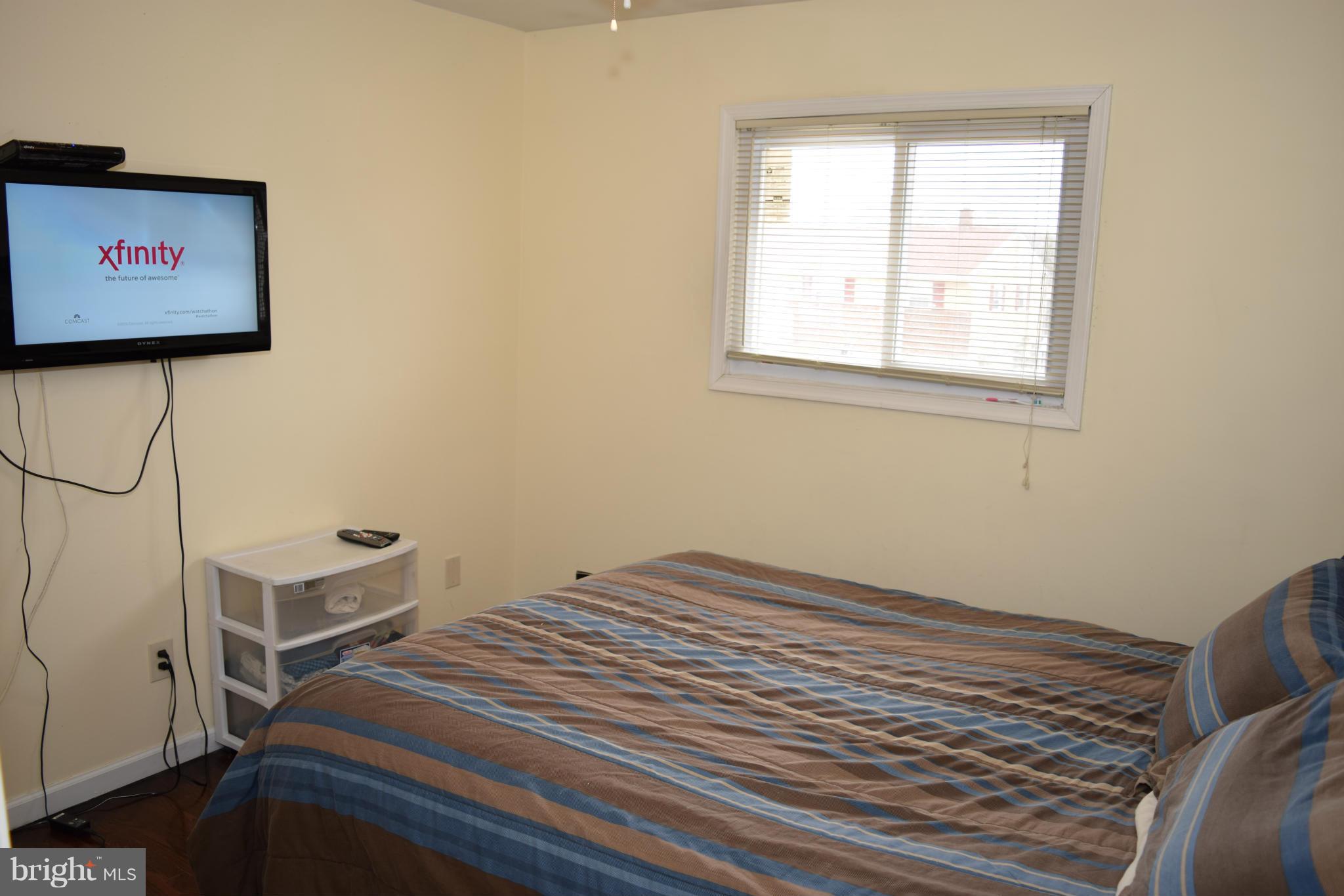 4775 Byron Road Baltimore, MD 21244 - Photo 28 of 29 a bedroom with a bed and a window