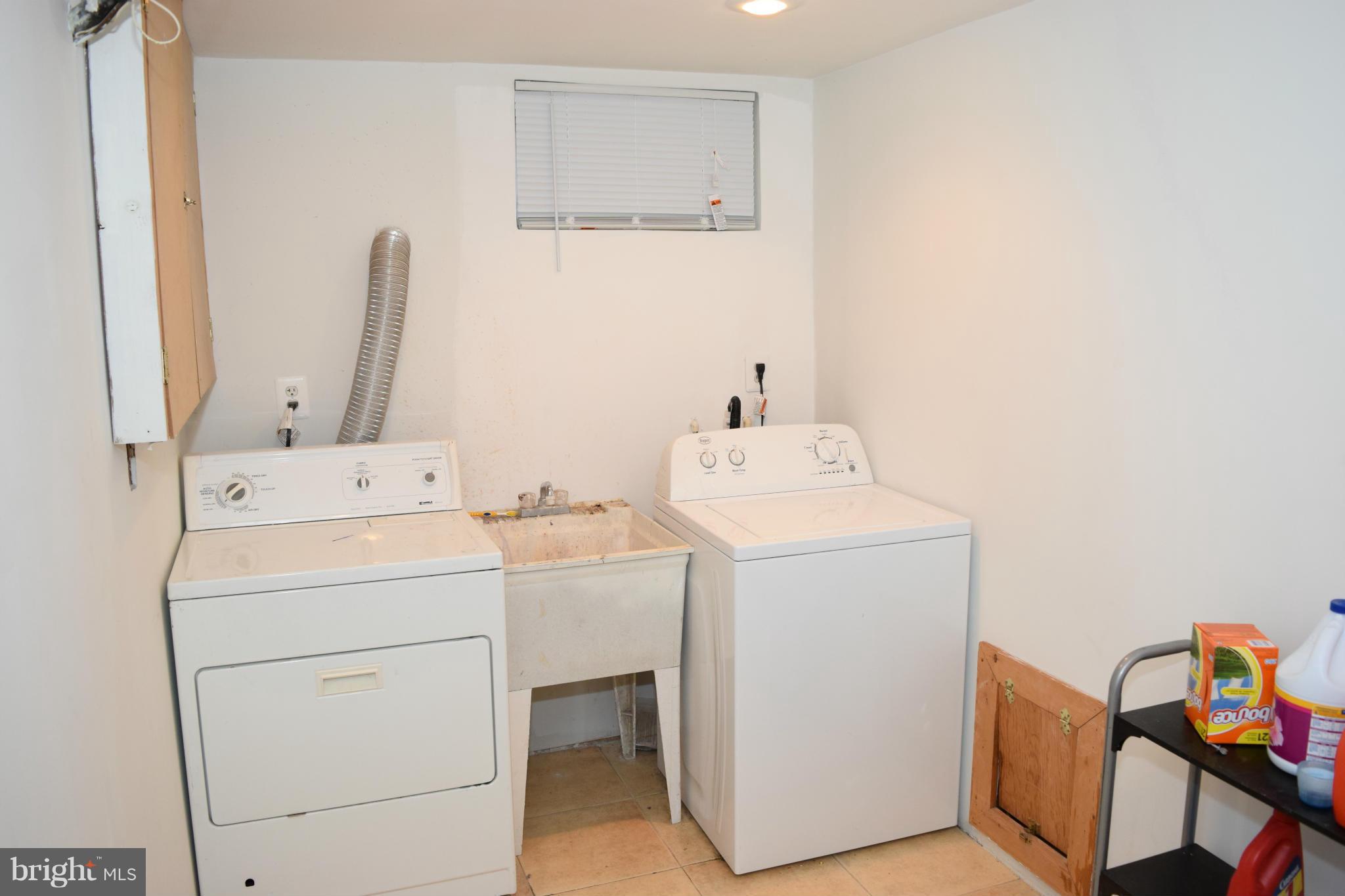 4775 Byron Road Baltimore, MD 21244 - Photo 29 of 29 a utility room with dryer and washer