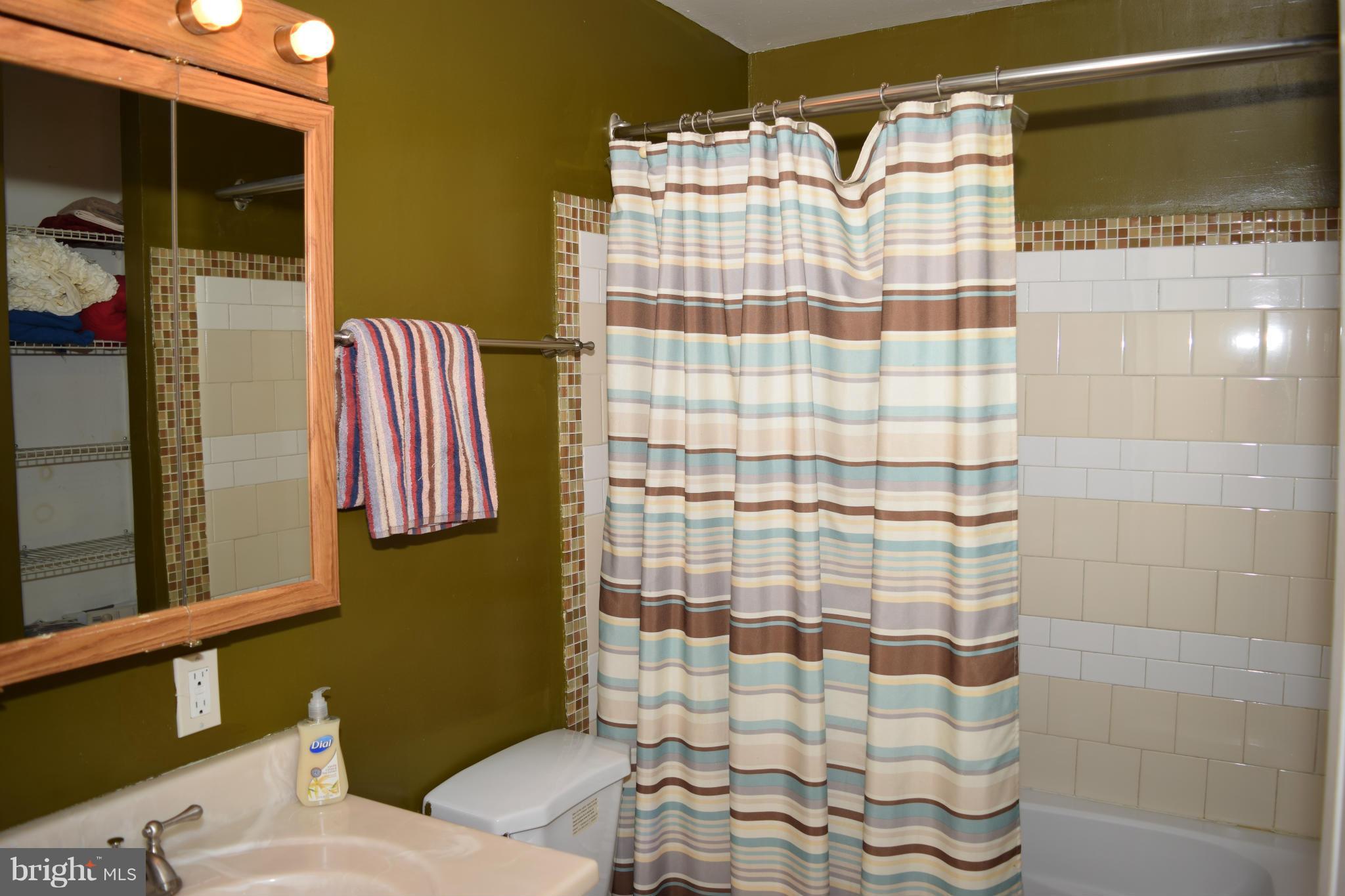 4775 Byron Road Baltimore, MD 21244 - Photo 6 of 29 a bathroom with a sink toilet and shower