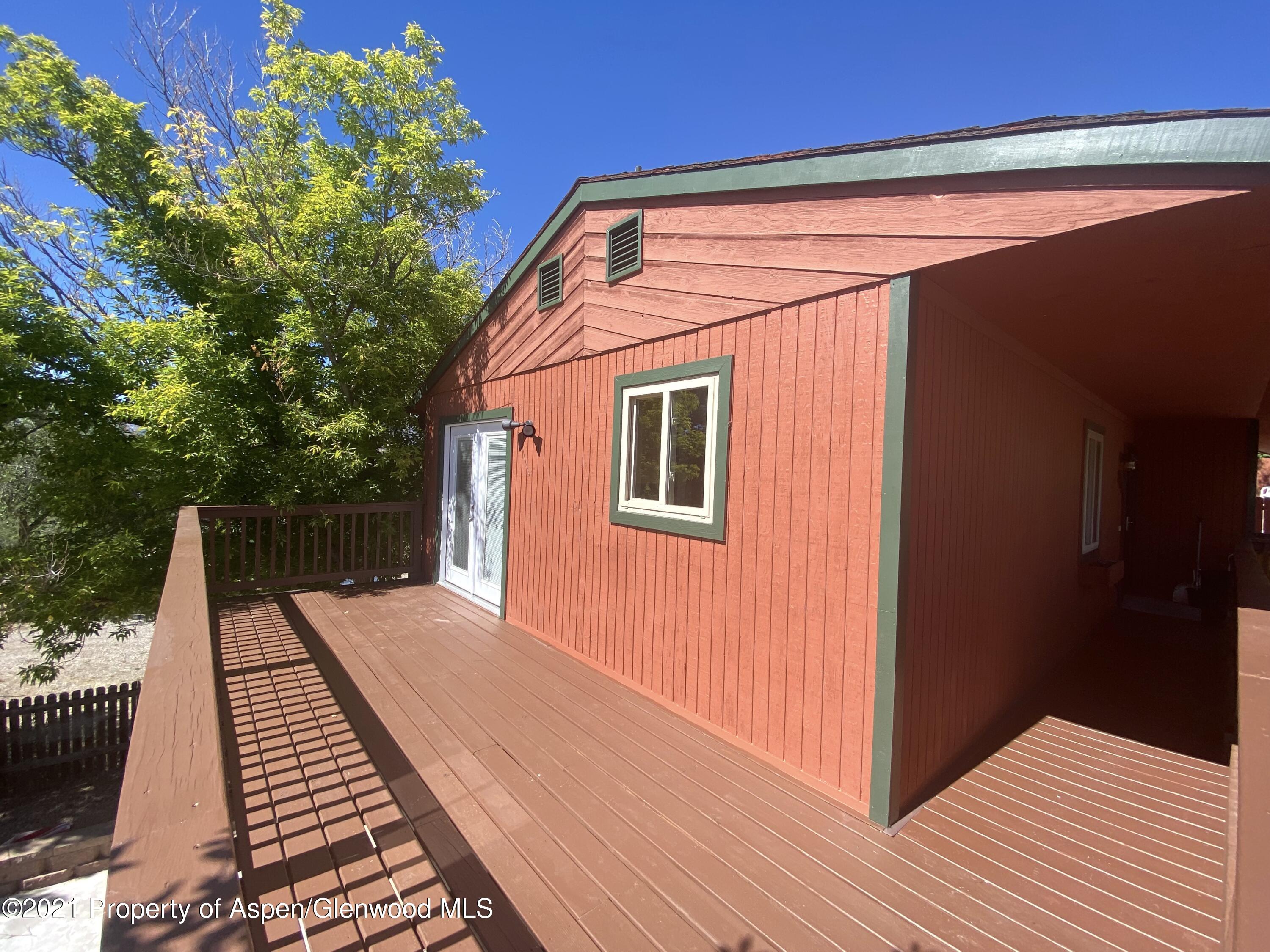 317 Clarkson Avenue Rifle, CO 81650 - Photo 2 of 17 a backyard of a house