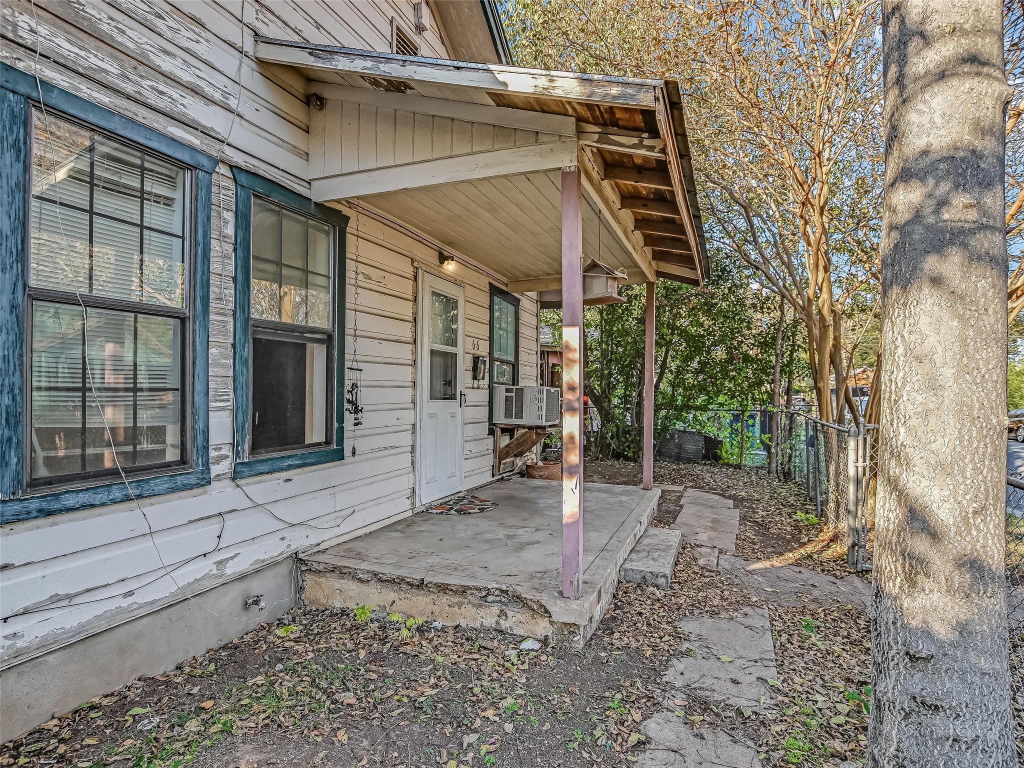 66 Cross Street Austin, TX 78702 - Photo 14 of 20 a view of a house with a yard