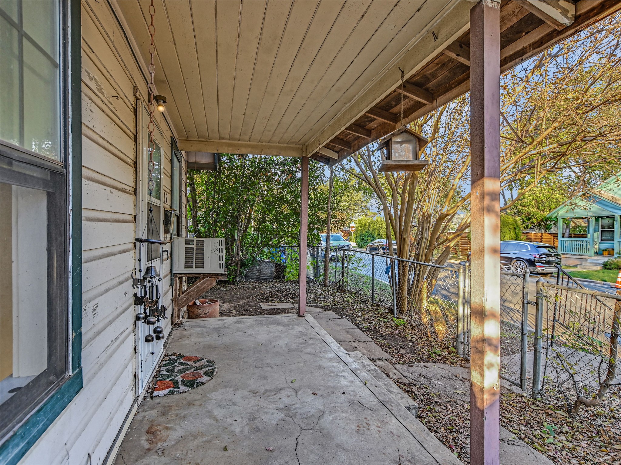 66 Cross Street Austin, TX 78702 - Photo 15 of 20 a view of a backyard with fountain plants and large tree