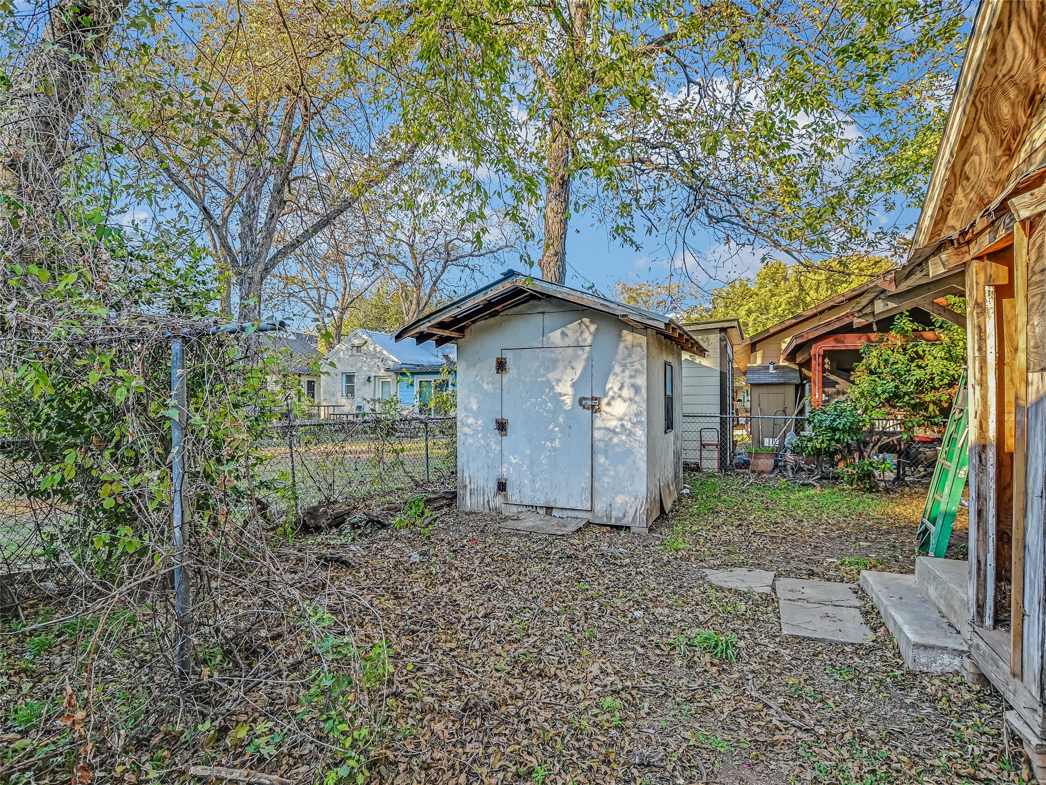 66 Cross Street Austin, TX 78702 - Photo 19 of 20 a view of a house with a yard and tree s