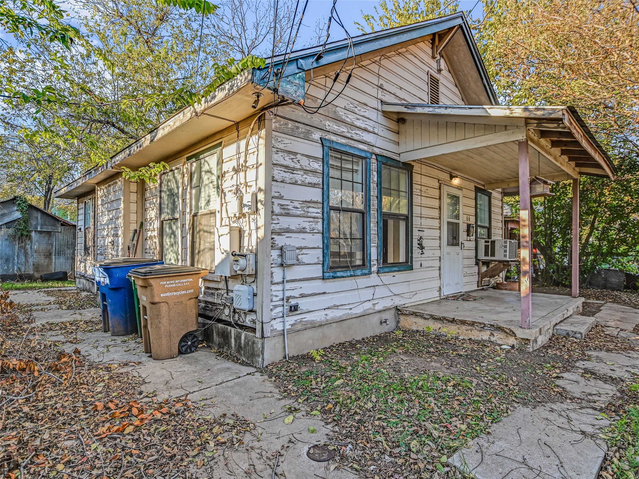 66 Cross Street Austin, TX 78702 - Photo 3 of 20 a view of a house with backyard and sitting area