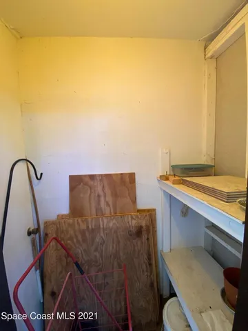 a bathroom with a sink mirror vanity and toilet