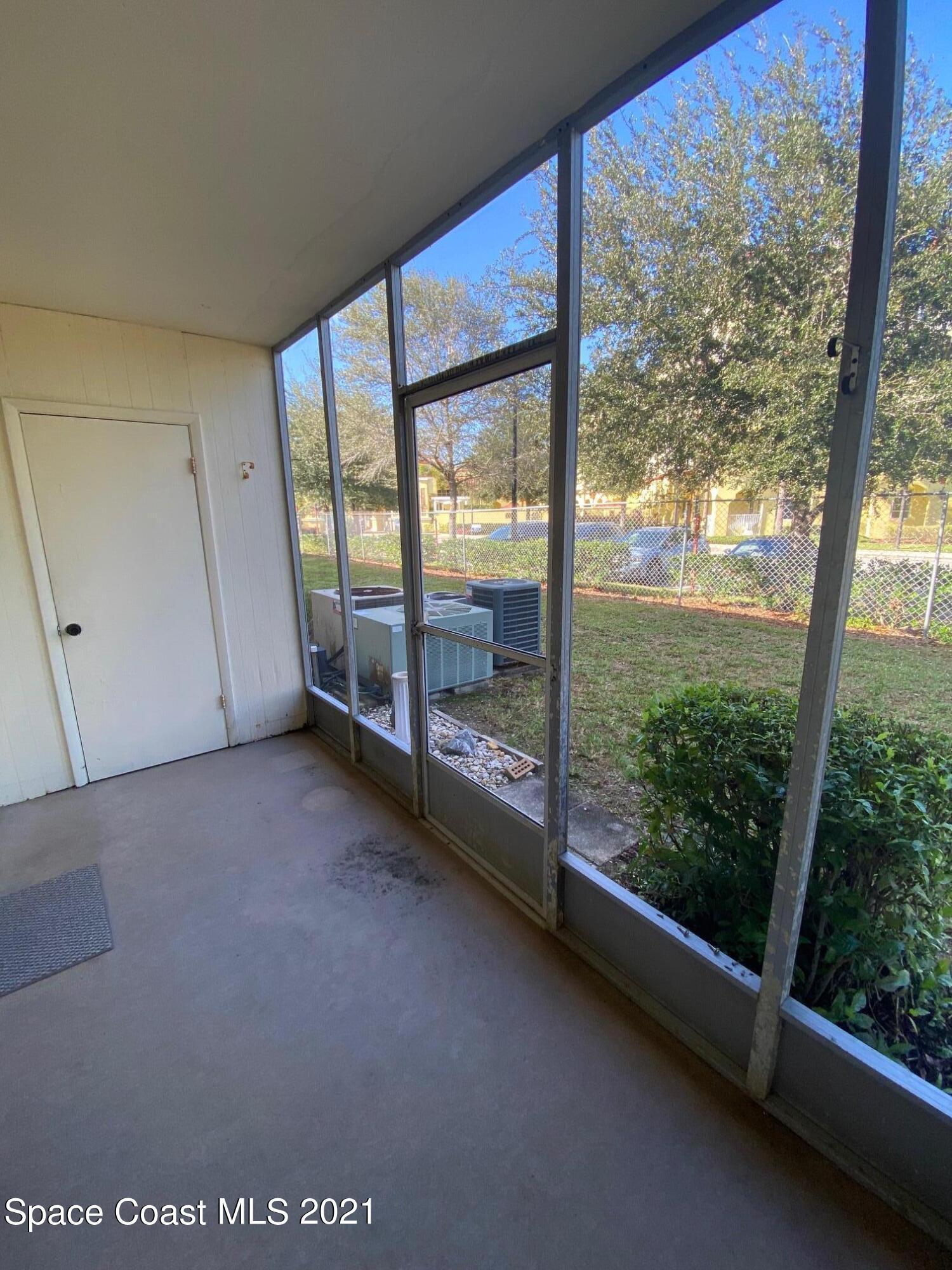 3135 Shady Dell Lane, Unit 112 Melbourne, FL 32935 - Photo 10 of 22 a view of room with window