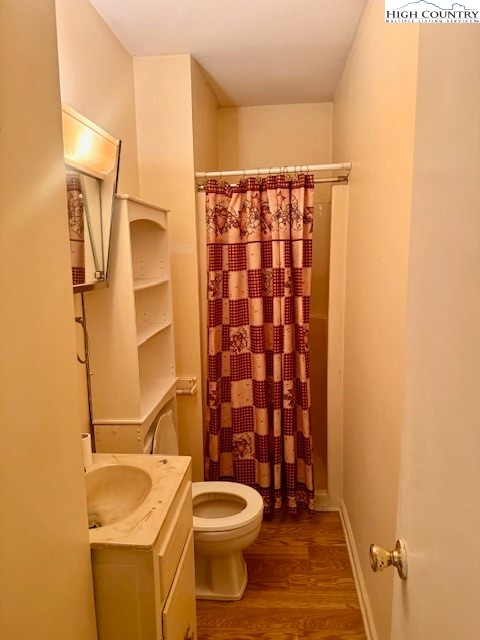 2202 Old 16 Highway Jefferson, NC 28640 - Photo 11 of 27 a bathroom with a sink toilet and shower