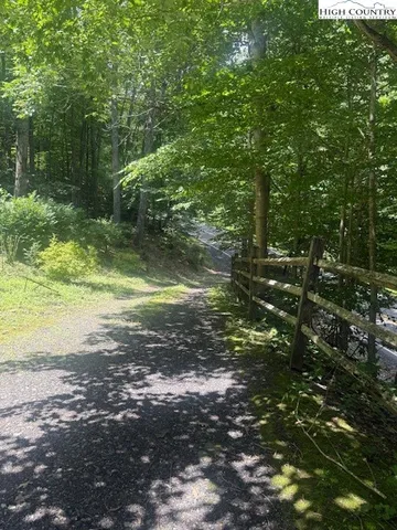 a view of a wooden fence