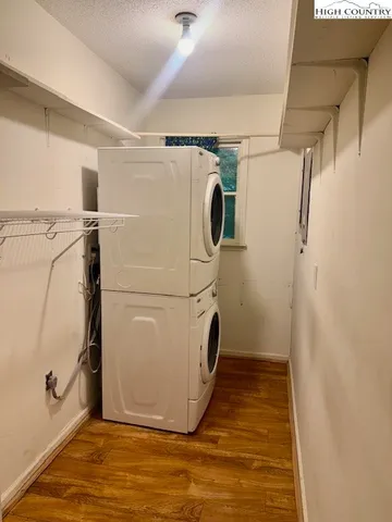 a bathroom with a double vanity sink and mirror