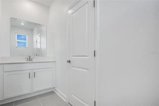 a view of a storage & utility room with a window