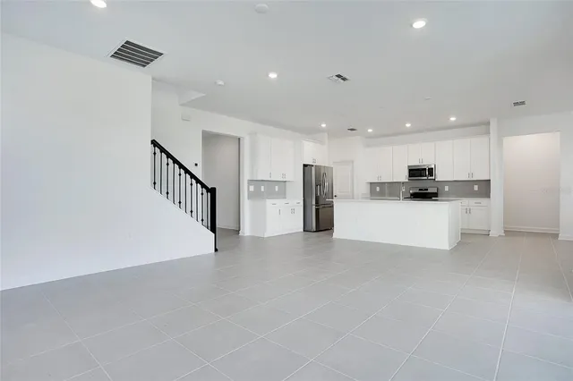 a view of a kitchen with a sink