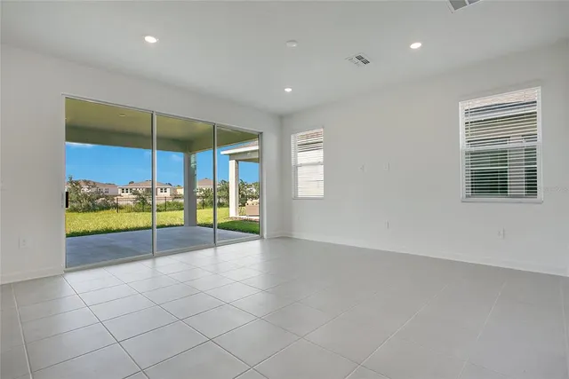 a view of an empty room with window