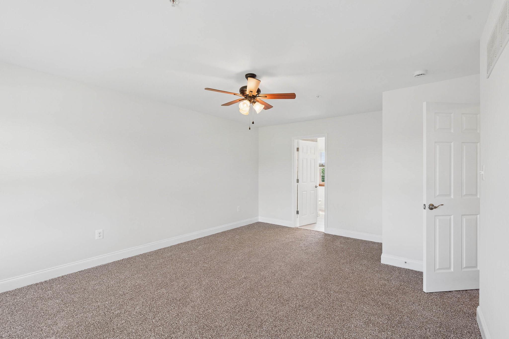 4521 Beckleysville Road Hampstead, MD 21074 - Photo 29 of 54 And features new carpet and a ceiling fan.