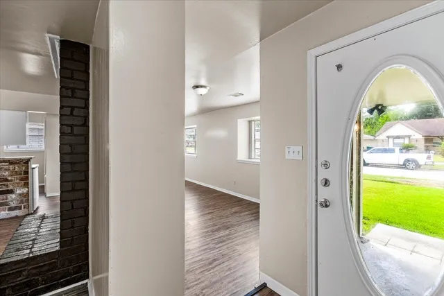 a view of living room with a fireplace