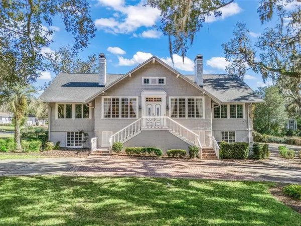 a view of a house with a swimming pool