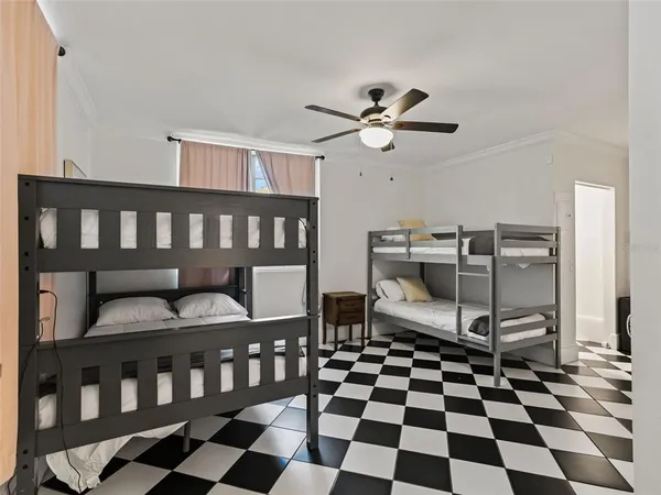 a room with a black white checkered floor