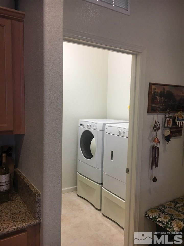 9236 Maplehurst Trail Reno, NV 89523 - Photo 16 of 25 a utility room with dryer and washer