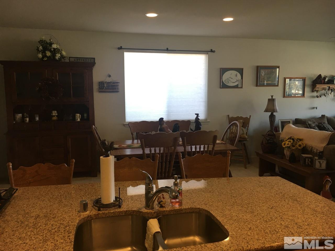 9236 Maplehurst Trail Reno, NV 89523 - Photo 17 of 25 a view of a workspace room with furniture and window