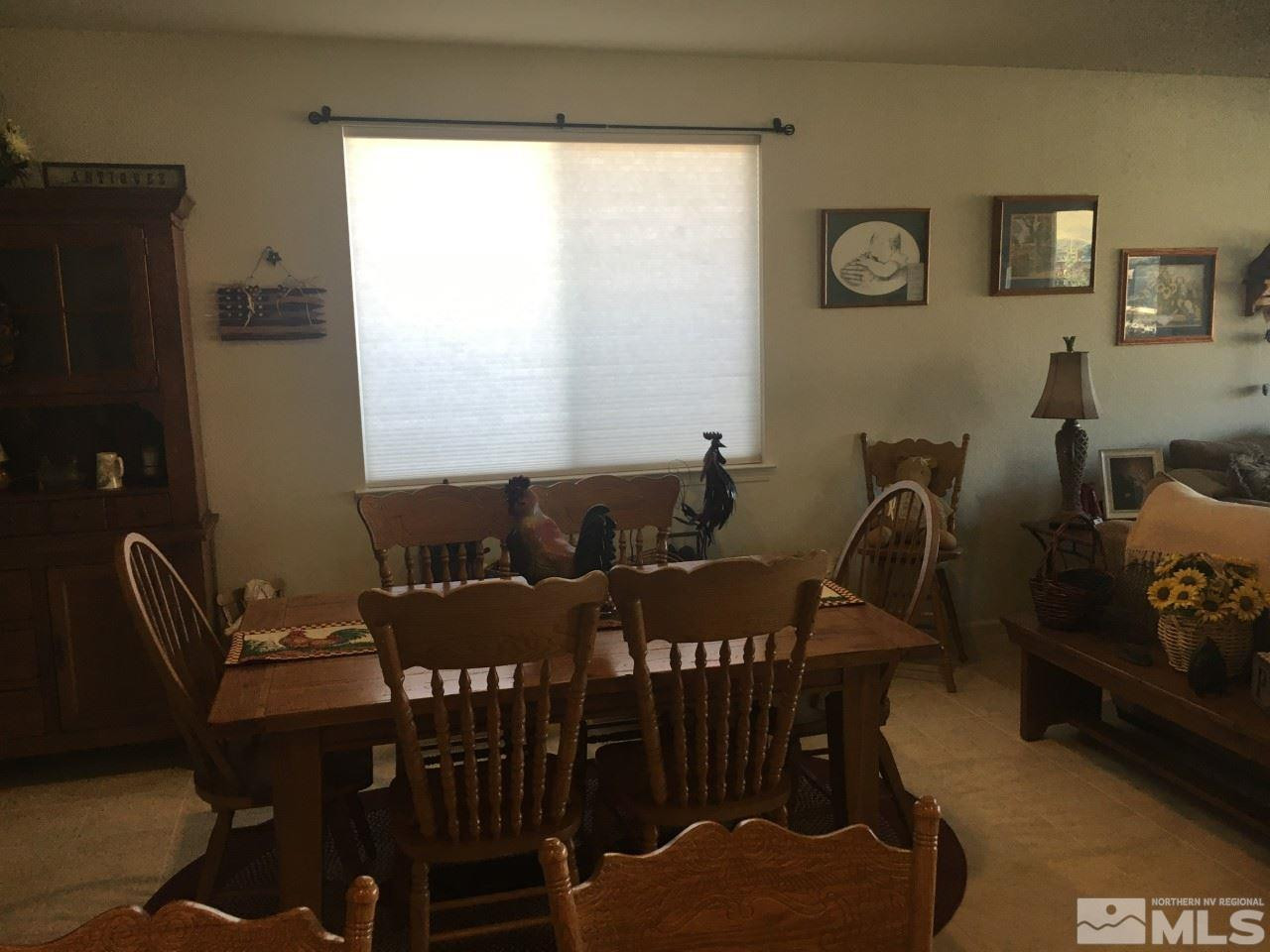 9236 Maplehurst Trail Reno, NV 89523 - Photo 18 of 25 a view of a dining room with furniture